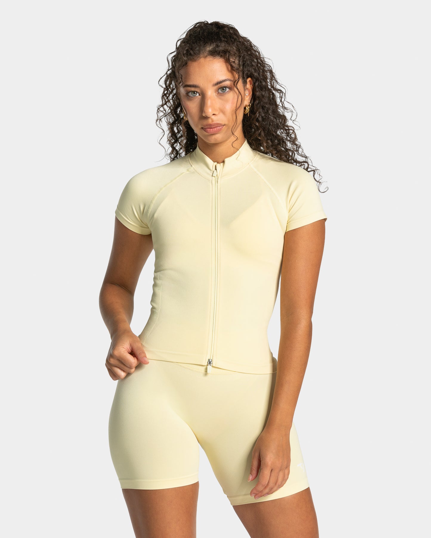 Haut à manches courtes zippé Lift « Butter Yellow »